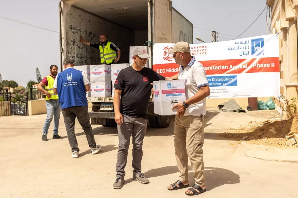 Saleh Saeed from the DEC at a food distribution in Lebanon